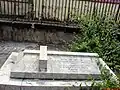 The epitaph read: William John Duncan Rowley, Assistant Superintendent of Police, Palghaut, who was killed at Tirurangadi by a mob of mappilas at the outbreak of the Mappila Rebellion on August 20, 1921 - aged 28