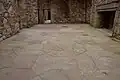 Detail of stone tile floor in main hall