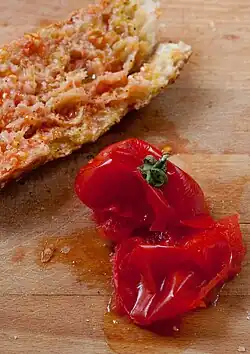 Pa amb tomàquet with the squeezed tomato after its use