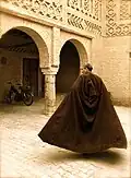 A local in traditional Berber clothing in the old Medina of Tozeur, 2007