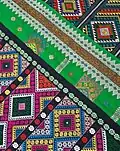Argons with 'bugri phul' (black) and 'chiwar phul' (green) motif along the borders.