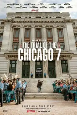 Crowds of protesters outside the Chicago courthouse, with the one of the "Chicago 7" entering the building.