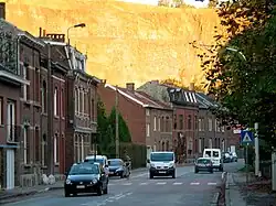 Trooz: main street, with the cliffs behind illuminated by the setting sun