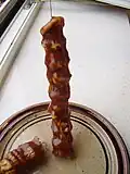 Sharots, often referred to as "Armenian Snickers" for its combination of nuts and fruit-based coating