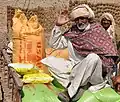 Elderly Sindhi man in Sindhi Salwar Kamis, Patko and Ajrak