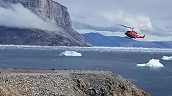 Air Greenland Bell 212 approaches Uummannaq Heliport over Assorput Strait