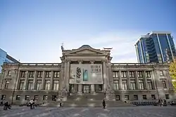 Vancouver Art Gallery seen from the plaza, with a banner to promote the Modern in the Making exhibition.
