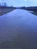 Veliki kanal which runs south of the village