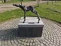 Drinking calf statue