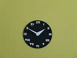 Mural clock in the young man chamber