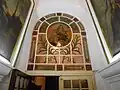 Stained glass window decorating the interior.