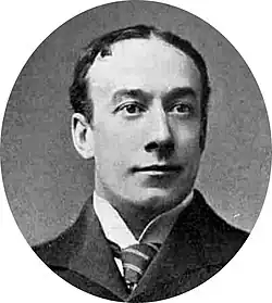 middle-aged white man, clean shaven, receding hair