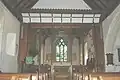 13th-century early Decorated Gothic chancel, restored in 1881