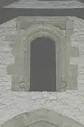 Door to 17th-century tower, above the tower arch and just under the nave roof