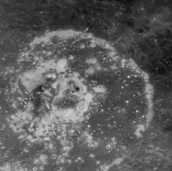 Closeup of Warhol at high sun angle showing the abundant hollows on the crater floor (MESSENGER NAC)