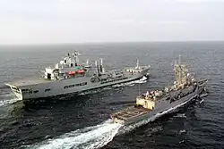 Wave Ruler (background) refuels USS&nbsp;Robert G. Bradley in the Pacific Ocean.