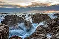 Image 13Waves on rocks at sunset in Sète, France