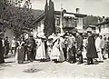 White Flower Day 1912 (May 3, 1912). The grand duchesses Anastasia and her sister Maria are selling white flowers to people.