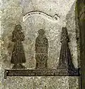 Monumental brass to William Wheteaker with his wife and son (1487)