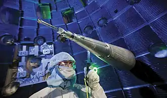 Image 5Engineers, scientists and technicians at work on target positioner inside National Ignition Facility (NIF) target chamber (from Engineering)