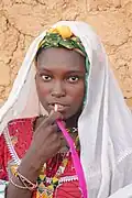 A young girl in traditional dress, Bani, 2010