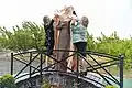 Sculptor Nune Tumanyan and philanthropist Judy Saryan unveil the statue