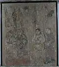 Khitans holding wrapped up banners, maces, and drums