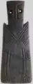 Anthropomorphic Schist Plaque with arms and hands represented along the body.